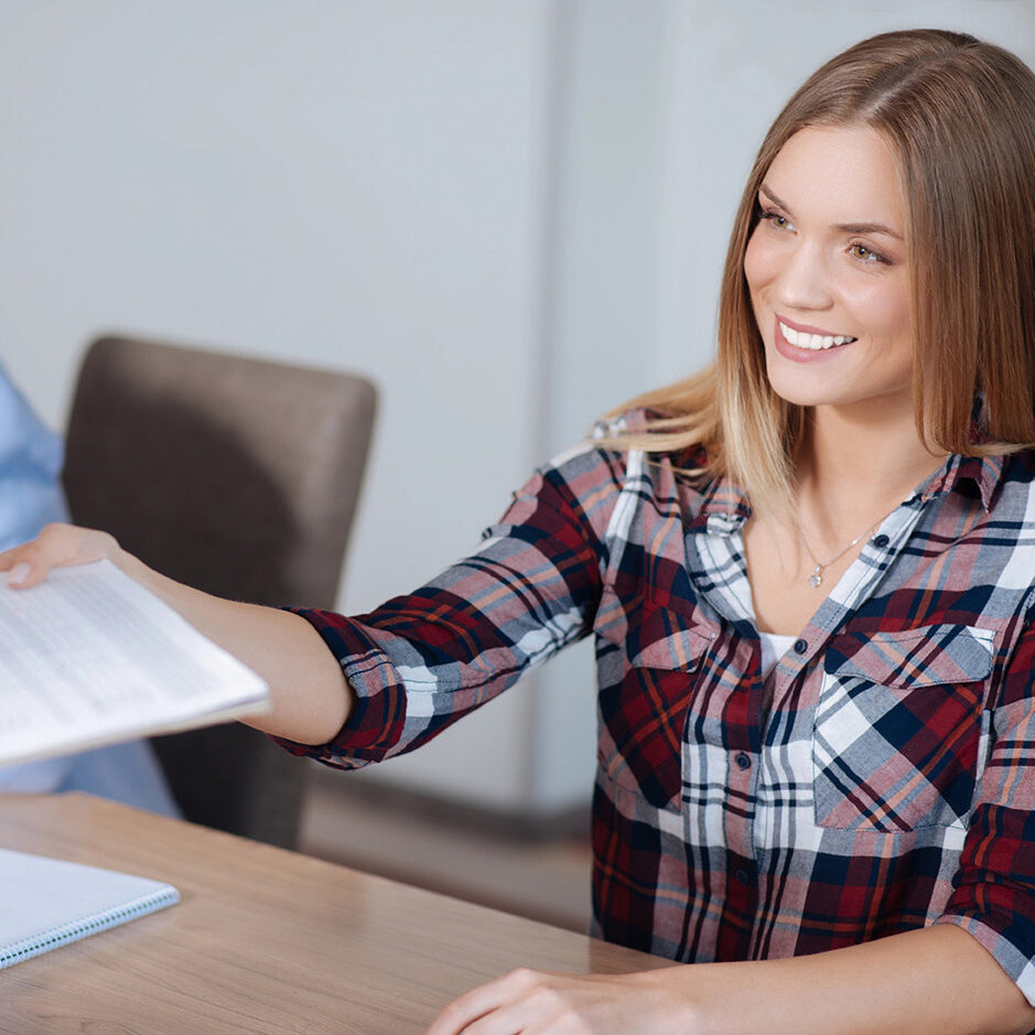 ADR depositphotos_154629716-stock-photo-beautiful-smiling-female-giving-folder copy