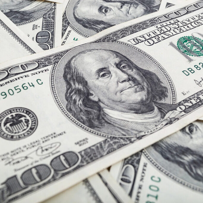 Texture US dollars. Background of one hundred dollar bills.