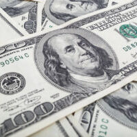 Texture US dollars. Background of one hundred dollar bills.