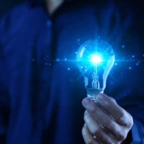 businessman holding a light bulb Digital technology. imagine an idea Creative and innovative. brain to brainstorm ideas in business. Strategies for development, growth, and success